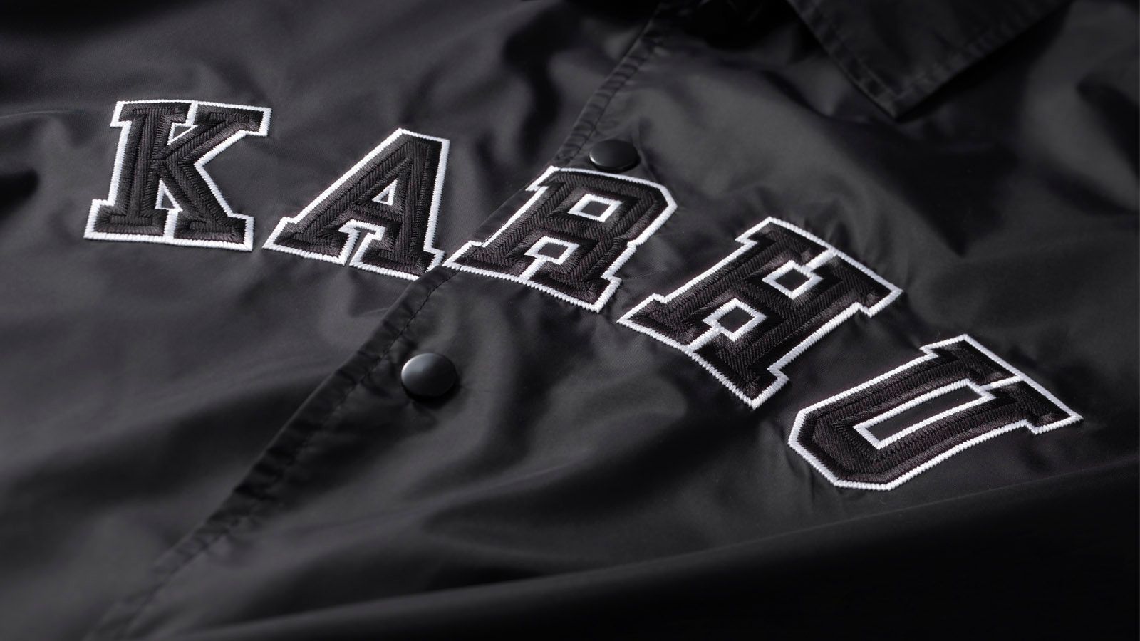 Karhu Worldwide Coach Jacket - Black | Lifestyle Jacket – Karhu US